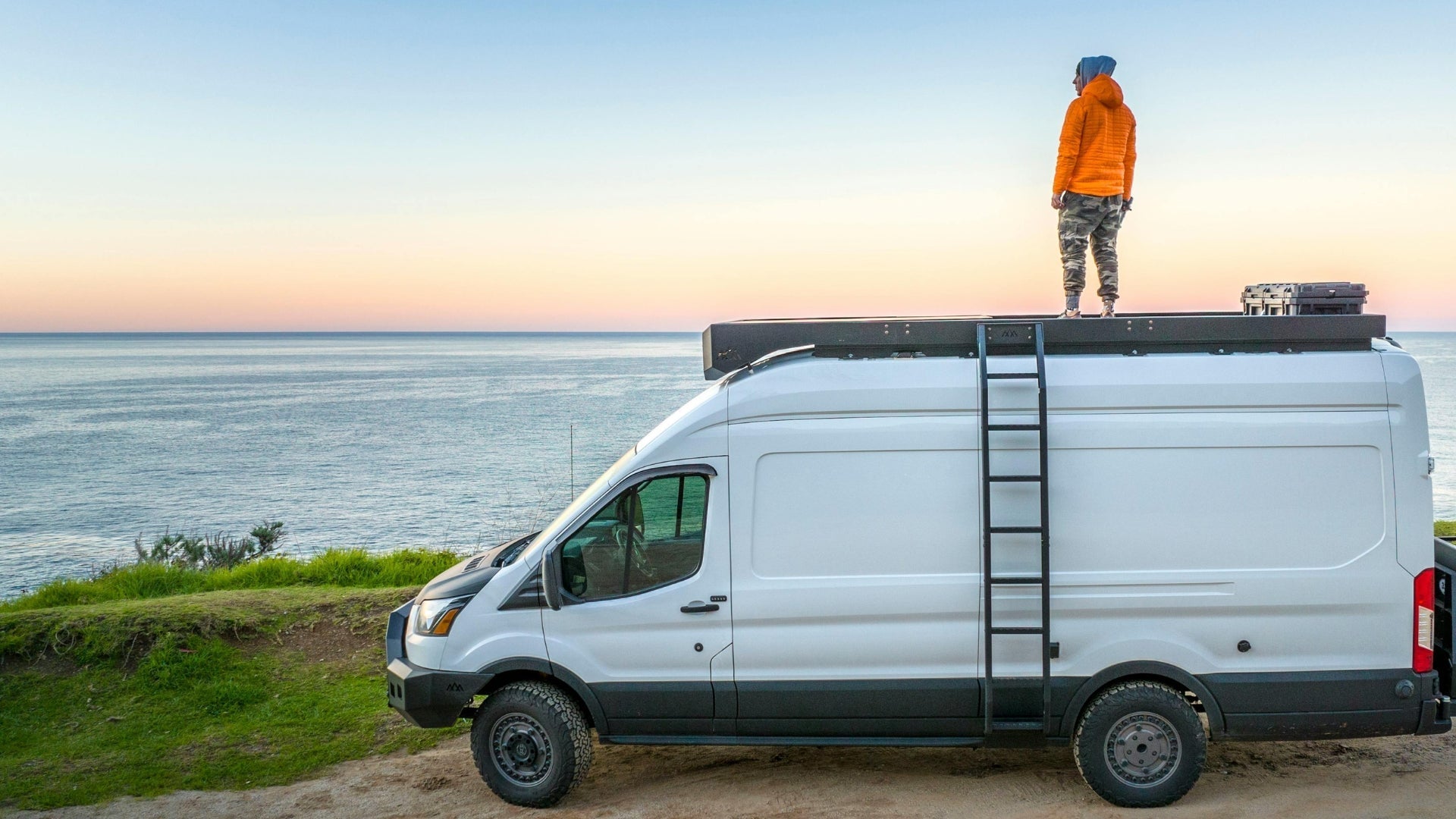 Campervan parked beside the coast for off-grid van travel