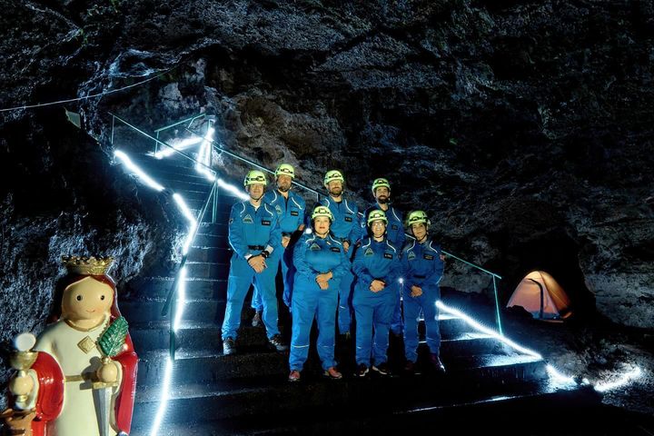CAMões expedition team wearing helmets inside the Gruta do Natal volcanic cave