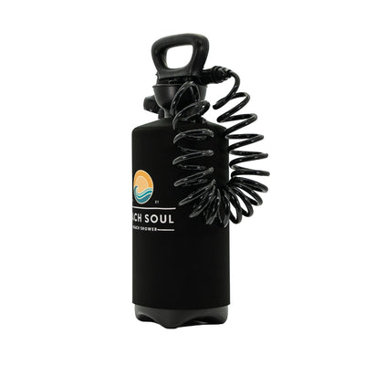 Product Photo of a black Beach Soul portable beach shower bottle featuring an ergonomic handle, a black coiled hose, and a colorful orange sun and blue wave logo