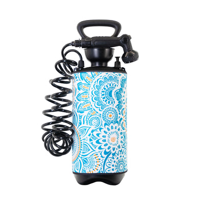 Portable pressure shower with a black pump handle, coiled black hose, and a tank adorned with a vibrant blue and orange mandala pattern