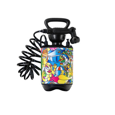 Black portable pressure shower featuring a vibrant cubist pop art beach scene with a stylized woman, surfer, striped umbrella, and lighthouse on its colorful body with a coiled hose