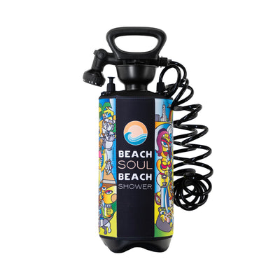 Product photography featuring art by Steven Bordona on a Beach Soul portable beach shower, showcasing a vibrant cubist-inspired sleeve with colorful beach and city scenes, highlighted by an orange sun and blue wave logo and a black coiled hose