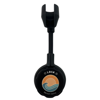 Black adjustable device with a U-shaped holder and a circular base featuring a LOCK dial and an orange sun with blue wave "Beach Soul" logo
